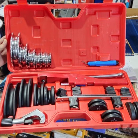 cintreuse arbalète rouge galets en plastique